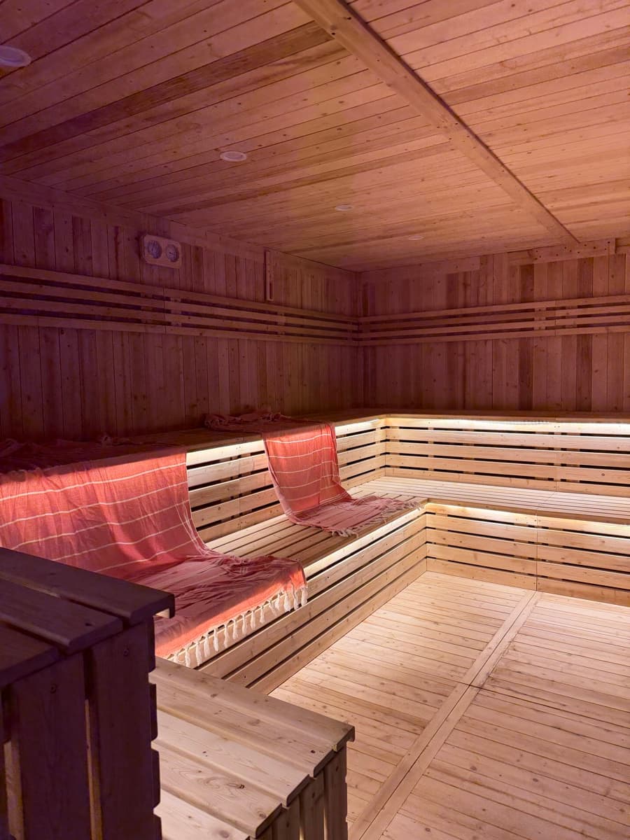 The main sauna, benches wrapping the room